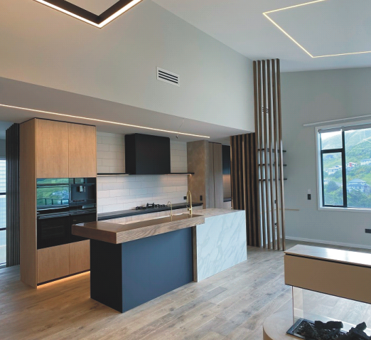 Contemporary timber and stone kitchen with island